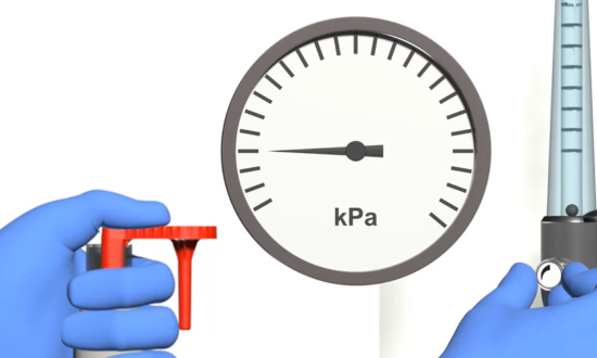 Using an anaesthetic breathing system leak tester 